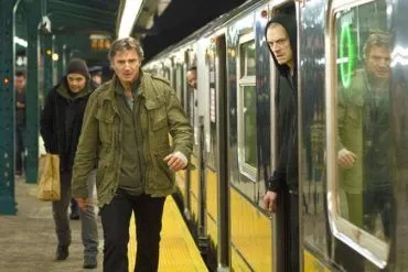 Joel Kinnaman y Liam Neeson en 