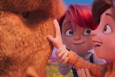 Buffalo Kids - Un Búfalo es acariciado por uno de los protagonistas